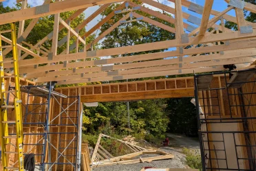 Wood framing under construction for a small building project in Huntsville, Ontario.